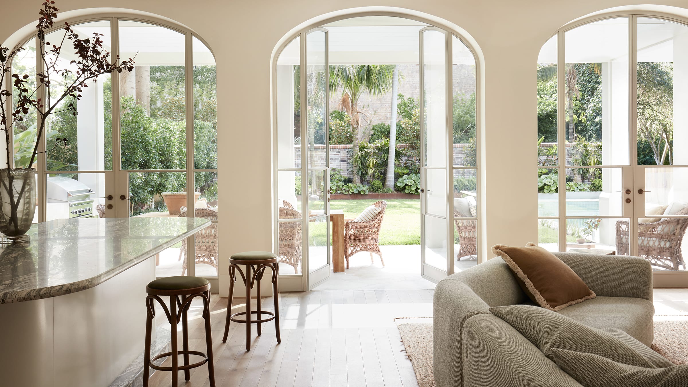 View of the residence's backyard through the kitchen