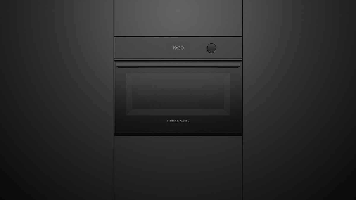 Built-in Convection Speed Oven Set into Black Cabinetry.