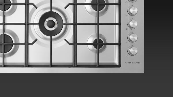 Top View of a Stainless Steel Contemporary Style Gas Cooktop.